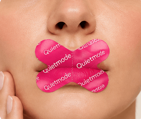 A pink Quietmode strip pressed over closed lips